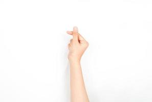 um gesto de mão que significa amor nos moldes coreanos. coleção da língua de sinais usando gestos com as mãos. foto