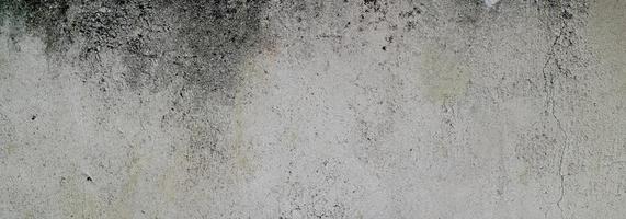 parede texturizada com cinza. textura de cimento de concreto ligeiramente cinza claro para o fundo. textura de pintura abstrata.