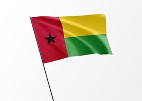 Bandeira da Guiné-Bissau voando alto no dia da independência da Guiné-Bissau de fundo isolado. coleção da bandeira nacional do mundo foto