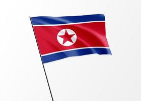 Bandeira da Coreia do Norte voando alto no dia da independência da Coreia do Norte de fundo isolado. Coleção da bandeira nacional mundial ilustração 3D foto