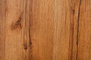 bela textura de madeira natural com rachaduras e um padrão vertical de fibras. foto