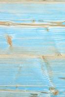 delicada cor azul-bege da textura de madeira de velhas placas pintadas com nós e listras horizontais.