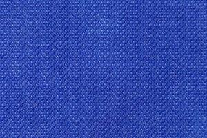 a superfície abstrata do tecido em azul para um padrão de fundo. um gráfico de elemento detalhado para um design criativo. foto