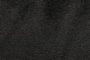a superfície abstrata do tecido em preto para um padrão de fundo. um gráfico de elemento detalhado para um design criativo. foto