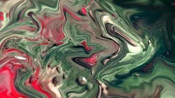 verde e rosa abstrato líquido metálico reflexão cor gradiente design de fundo. fundo geométrico abstrato com líquido foto
