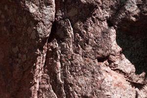 pedra vermelha textura cinza escuro pedras pretas todas são de mármore e textura para fabricação de ladrilhos foto