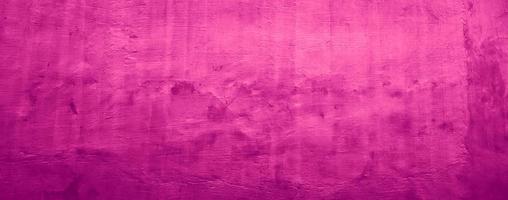 rosa roxo cor sólida textura de fundo abstrato de parede de concreto foto