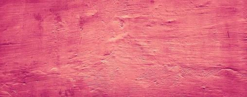 fundo de textura de parede de concreto vermelho rosa laranja pastel abstrato foto