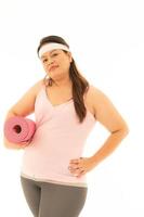mulheres obesas asiáticas estão acima do peso. com várias emoções para si mesma, comendo e se exercitando foto