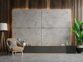 armário para tv na moderna sala de estar com poltrona marrom na parede de concreto. foto