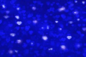 fundo azul bokeh em forma de coração para cartão de dia dos namorados ou papel de parede foto