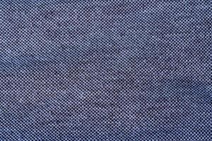 a textura de um tecido cinza escuro feito de puro algodão. foto