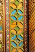 antigo mosaico asiático feito de madeira. elementos de ornamento oriental foto