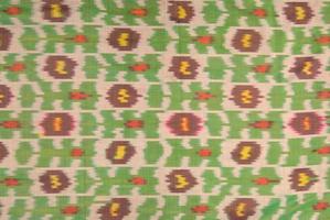fundo do tecido com ornamentos orientais e padrão multicolorido, têxtil foto