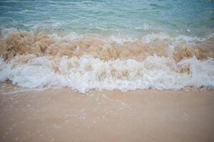 fundo de praia de areia de onda de vista para o mar foto