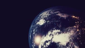 planeta terra visto do espaço à noite mostrando as luzes dos países foto