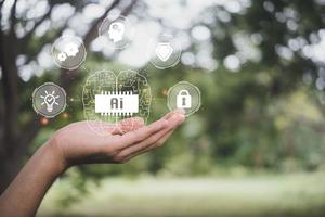 ai ícone do cérebro no fundo da natureza da mão. mineração de dados digitais e design de tecnologia de aprendizado de máquina para o cérebro do computador. ai conceito de inteligência artificial foto