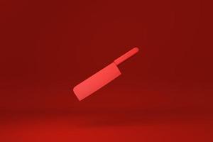 faca de cozinha flutuando em fundo vermelho. ideia de conceito mínimo criativa. renderização 3D. foto