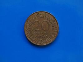 moeda de 20 centavos, frança sobre azul foto