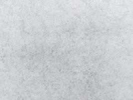 textura de tecido de feltro cinza branco. fundo de inverno. papel de parede foto