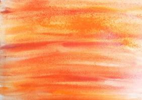 Resumo de textura de fundo aquarela. cor laranja. tinta de papel foto