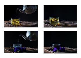 conjunto de chá de ervilha borboleta e chá de crisântemo na mesa de madeira e fundo preto. foto