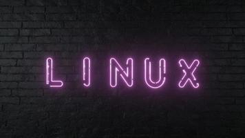 sinal de néon linux. emblema linux brilhante no fundo da parede de tijolos escuros. renderização em 3D foto