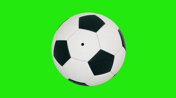 bola de futebol isolada em fundo verde. futebol esportivo. fundo de chave de croma. renderização em 3D foto