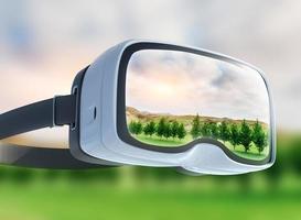 fone de ouvido de realidade virtual, dupla exposição, campo verde sob o sol foto