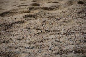 praia de areia de férias foto