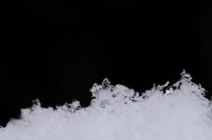 muitos cristais de neve frescos foto