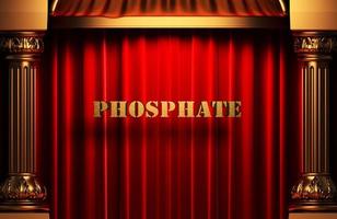palavra dourada de fosfato na cortina vermelha foto