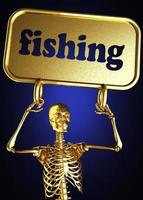 palavra de pesca e esqueleto dourado foto