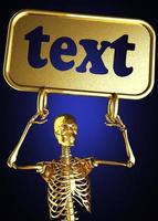 palavra de texto e esqueleto dourado foto