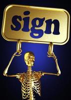 palavra de sinal e esqueleto dourado foto