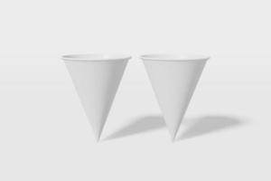 conjunto de dois copos de maquete de papel branco em forma de cone em um fundo branco. renderização em 3D foto