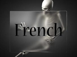 palavra francesa em vidro e esqueleto foto