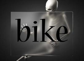 palavra de bicicleta em vidro e esqueleto foto