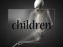 palavra de crianças em vidro e esqueleto foto