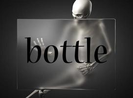 palavra de garrafa em vidro e esqueleto foto