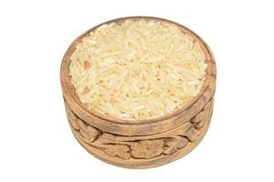 grão de arroz marrom em tigela de madeira foto