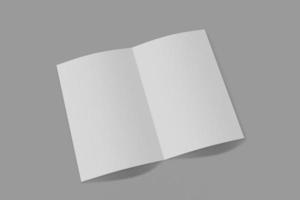 livreto vertical de maquete, folheto, convite isolado em um fundo cinza com capa mole e sombra realista. renderização 3D. foto