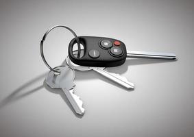 chaves de carro moderno para veículo de passageiros isolado na superfície lisa e branca. foto
