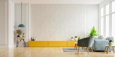 armário para tv na parede de gesso branco na sala com poltrona e sofá, design minimalista.