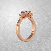 Posição de pé do anel de noivado de 3 pedras em renderização 3d de ouro rosa foto