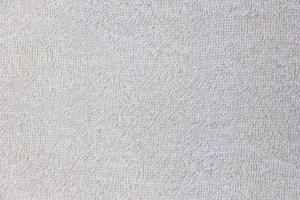 tecido de close-up toalha branca e fundo de textura. foto