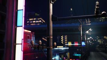 cena noturna da cidade japonesa com luzes de neon foto