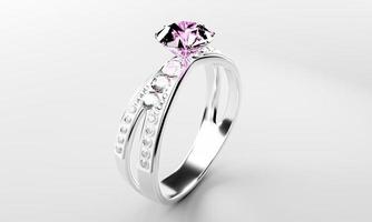 o grande diamante rosa é cercado por muitos diamantes no anel de ouro platina colocado sobre um fundo cinza. elegante anel de diamante de casamento para mulheres. renderização em 3D foto