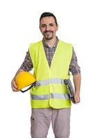 Construtor sorridente de uniforme em fundo branco foto