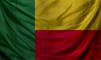 acenando a bandeira do benin. fundo para design patriótico e nacional foto